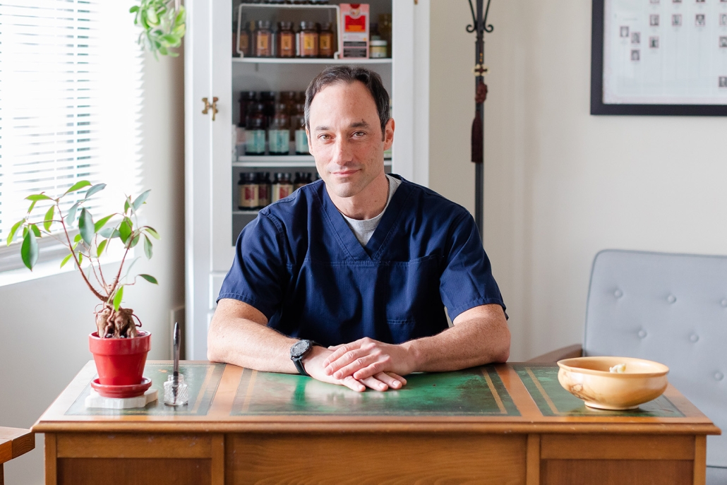 Shen Dao owner at desk