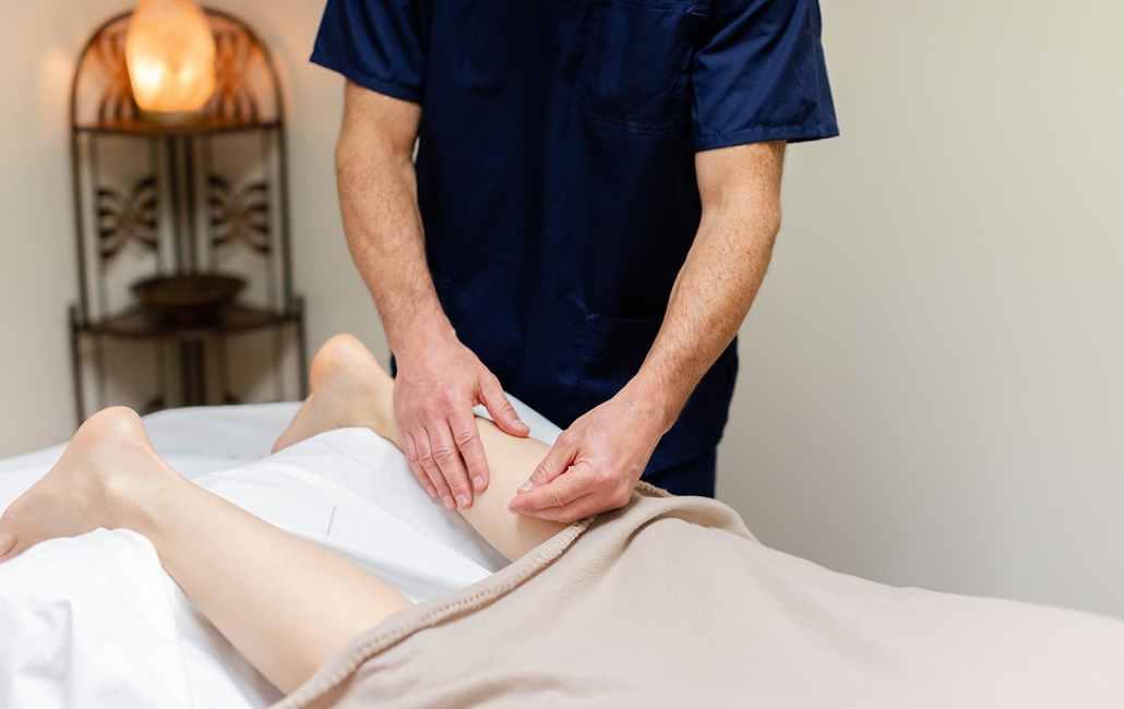 acupuncture on patient's leg